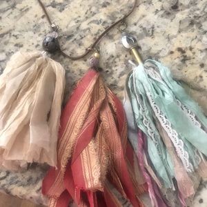 3 tassels plus leather rope